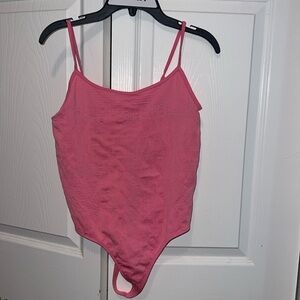 Hot pink Nike backless body suit